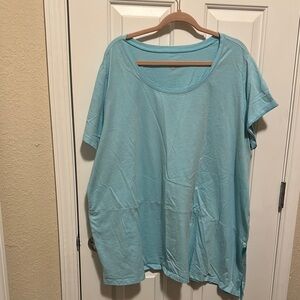 Blue Oversized Short Sleeve T-Shirt Angled Bottom of shirt